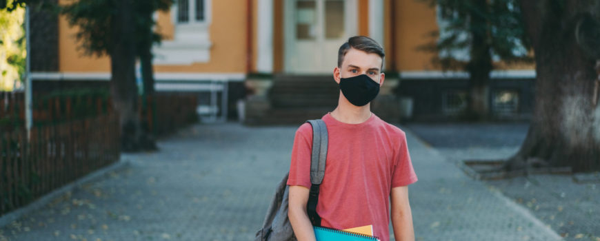 Student wearing protective face mask at school